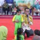 Pj Bupati Takalar Sosialisasi Gemar Makan Ikan dan Market Day di Hari Anak Nasional 