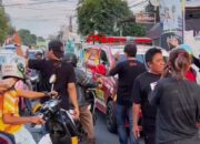 Putra Noling Grup Bagikan Ratusan Nasi Kotak ke Pengguna Jalan
