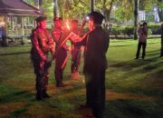 Kapolres Sinjai Hadiri Upacara Taptu dan Pawai Obor HUT RI ke-80