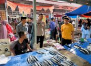 Ipda Sakaria Pimpin Patroli Sinergitas di Pasar Compong Pantau Stabilitas Sembako