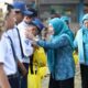 Kampanye Stop Boros Pangan, PKK Makassar Bagikan Kotak Makan Gratis ke Siswa SMP